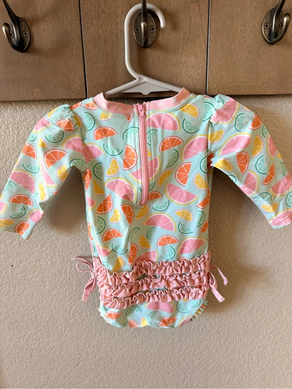 Ruffle Butts Pastel Citrus Long Sleeve Swimsuit - Pink, Mint, Peach